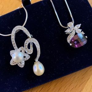 Pear and amethyst necklaces